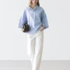 Flowing Blouse with Buttoned Collar Detail