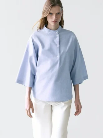 Flowing Blouse with Buttoned Collar Detail