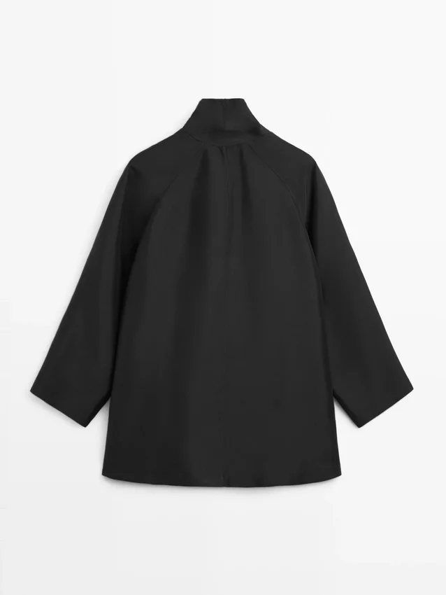 Flowing Voluminous Cape with Button Details Flowing Voluminous Cape with Button Details